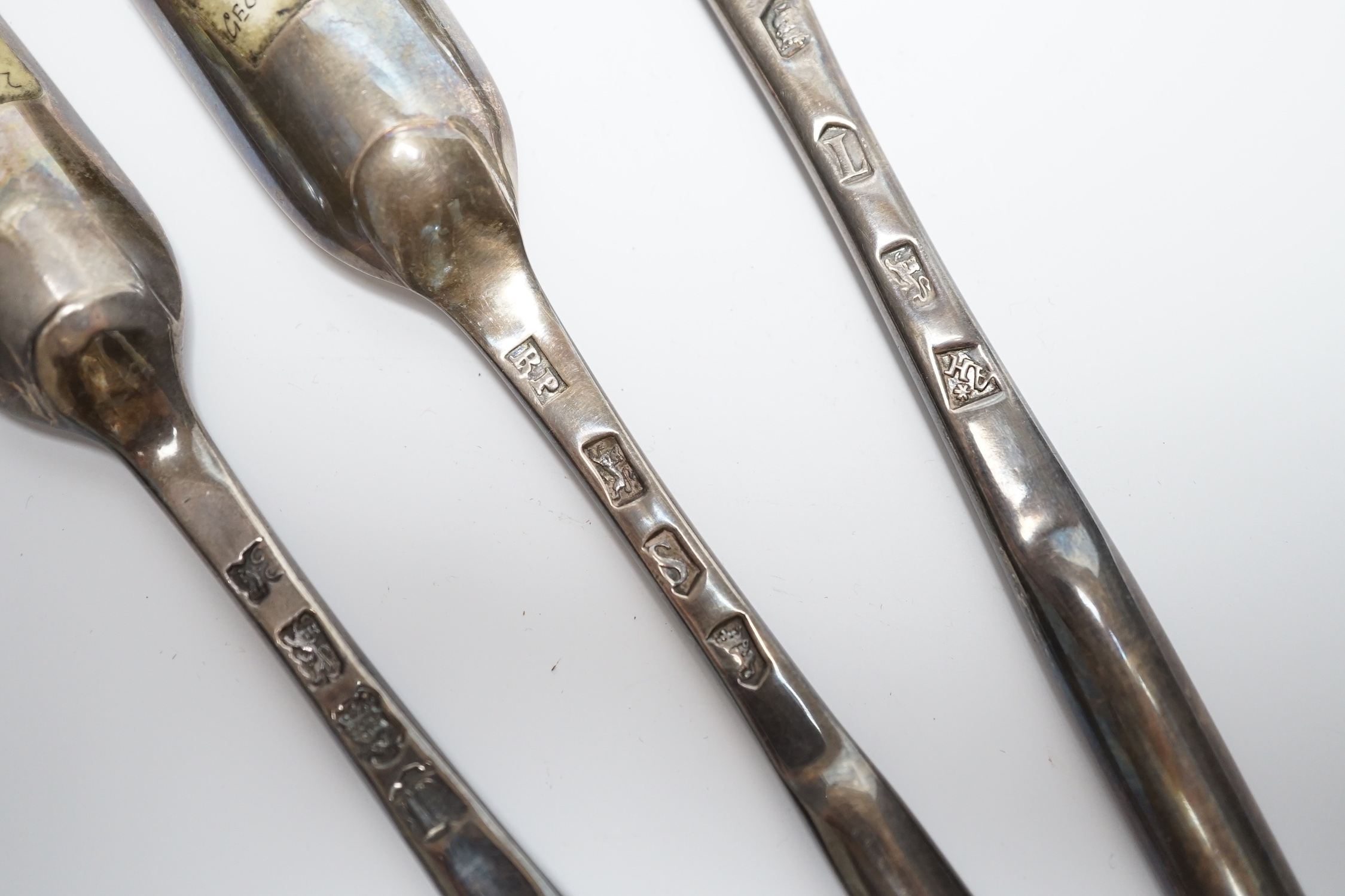 Three George II silver marrow scoops, Richard Pargeter, London, 1733, 20.7cm, Ann Hill, London, 1734 and Ebeneezer Coker?, London, 1755.